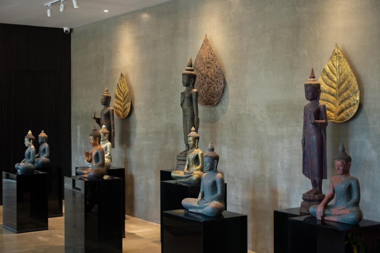 Eightfold Urban Resort Siem Reap Dış mekan fotoğraf A collection of Thai and Laotian art
